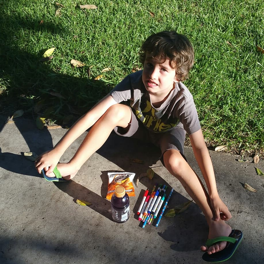 Markers goldfish and Gatorade #threetoflee challenge with a five-year-old for refugees