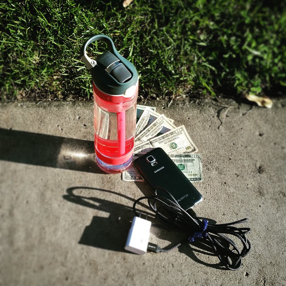water bottle, money, phone #threetoflee