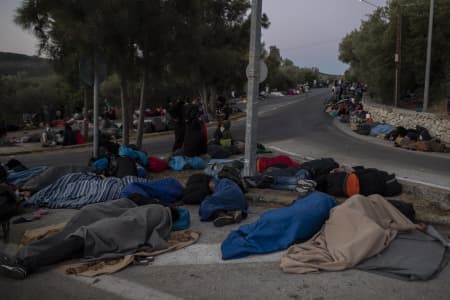 How we can help refugees sleeping in the streets REfugee camp Fire